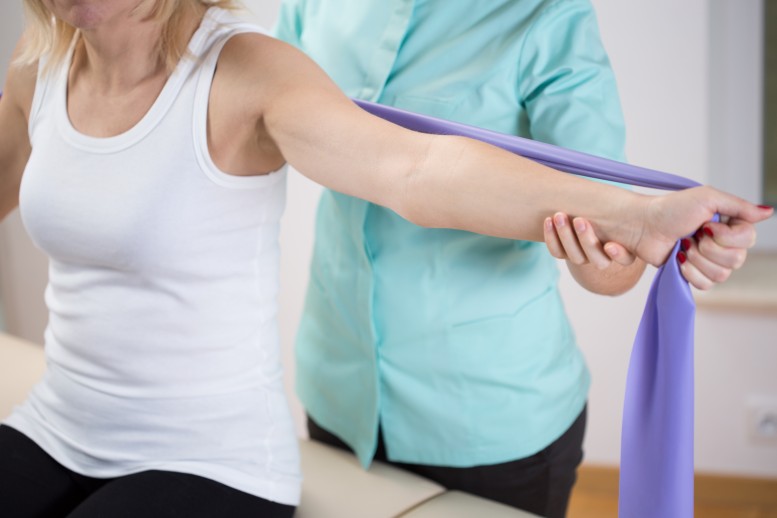 Patient stretching with an arm band