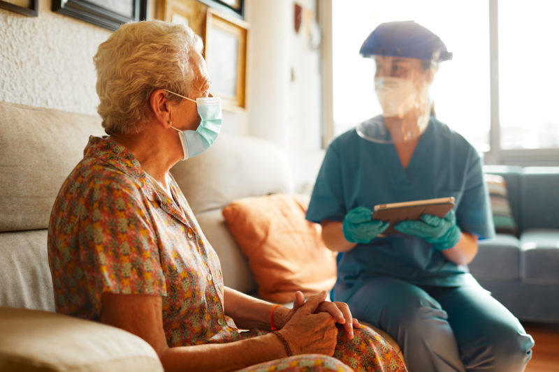 Doctor visiting a senior patient